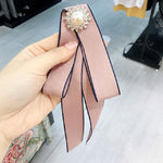 Spilla fiocco con strass e perle per donna 15x12 cm
