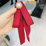 Spilla fiocco con strass e perle per donna 15x12 cm
