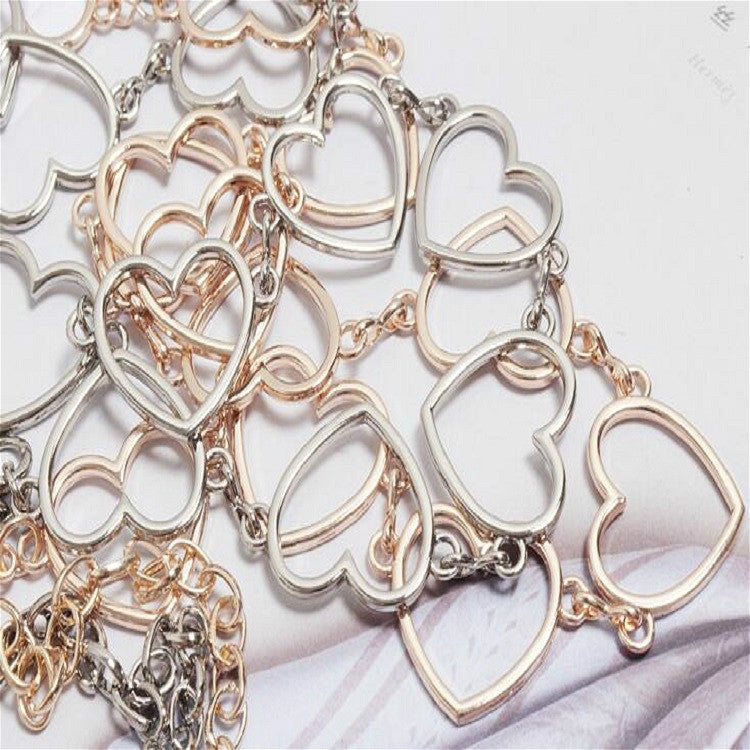 Cintura per camicia elegante con catena in vita in metallo a forma di cuore semplice e selvaggia