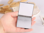 Mini specchio cosmetico pieghevole con diamante fatto a mano, specchio portatile, fiocco con gemma a doppio lato